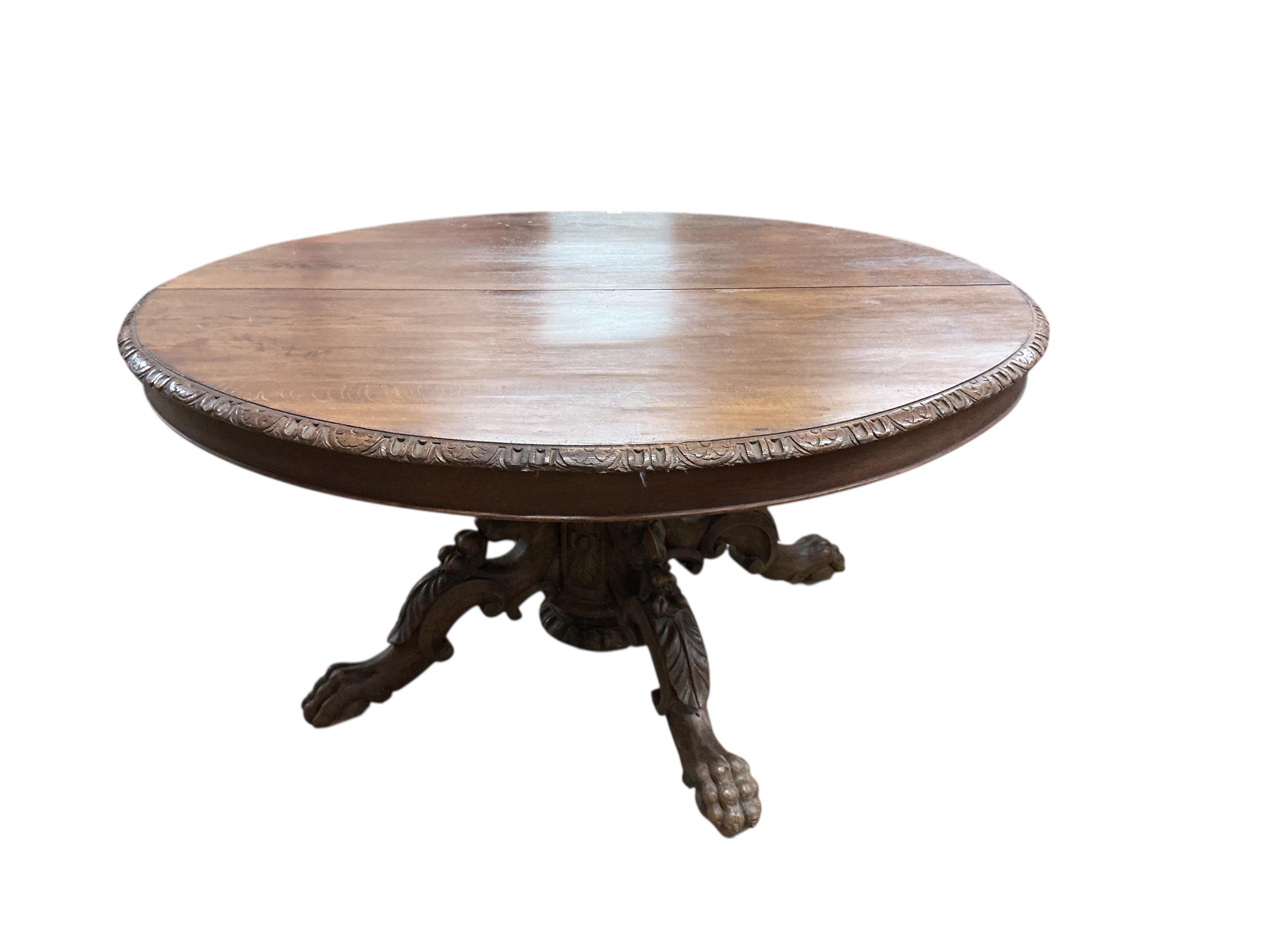 A 19th century oval oak extending dining table, (no leaves), width 142cm, depth 122cm, height 71cm